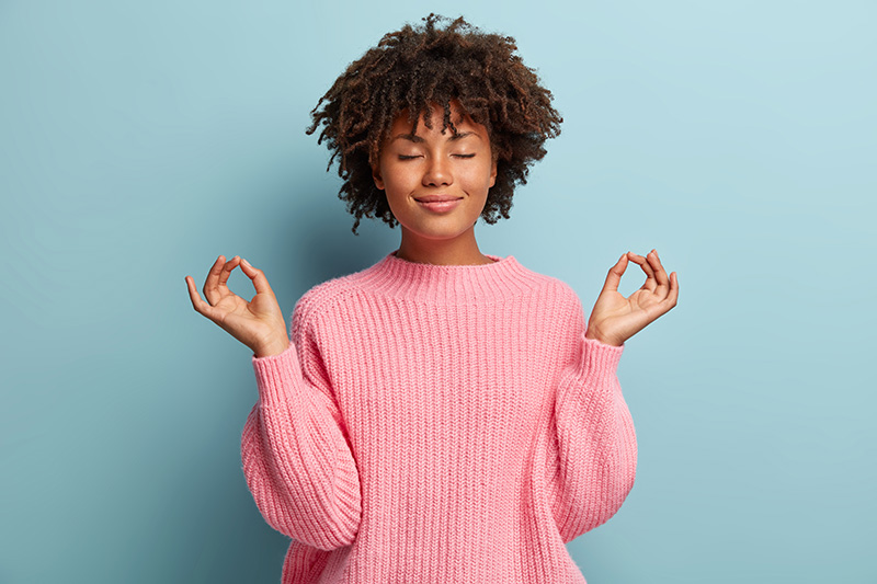 woman meditating for heart health